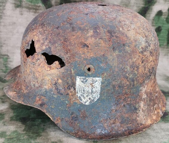 Wehrmacht helmet with combat damage from the Battle of Kursk