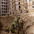 Soviet troops advancing through a trench during or after the battle of Stalingrad, late 1942.