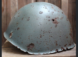 Italian helmet M33 / from Karelia