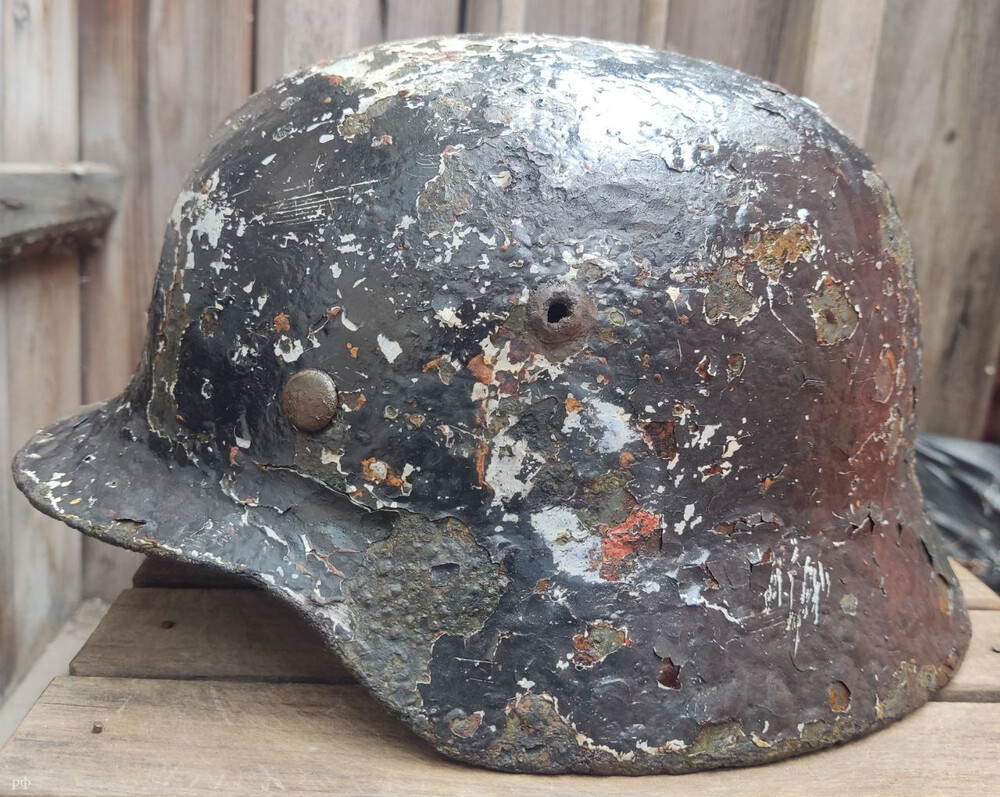 Waffen SS helmet M35 DD / from Staraya Rusa
