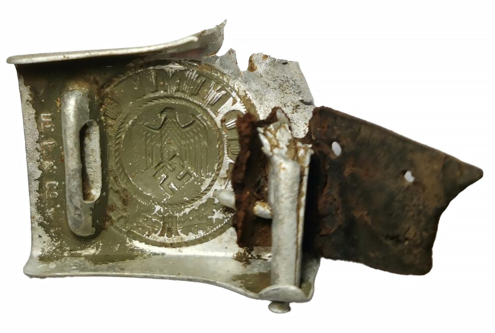 Battle damaged Wehrmacht belt buckles / from Demyansk