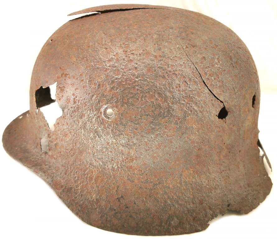 Damaged German helmet M40 / from Pskov