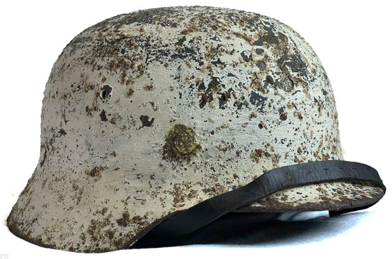 Winter camo German helmet M35 / from Velikie Luki