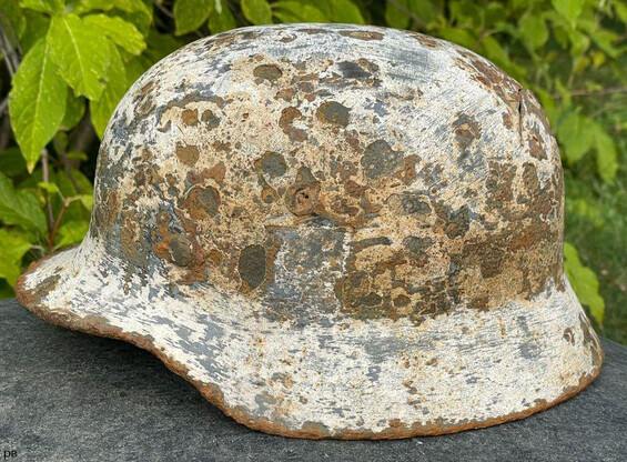 Winter camo German helmet M40 / from Smolensk