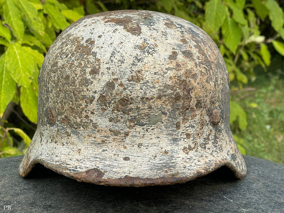 Winter camo German helmet M40 / from Smolensk