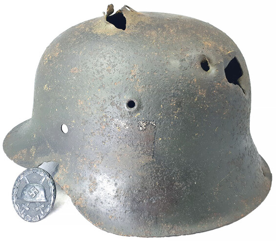German helmet M42 + wound badge / from Kursk