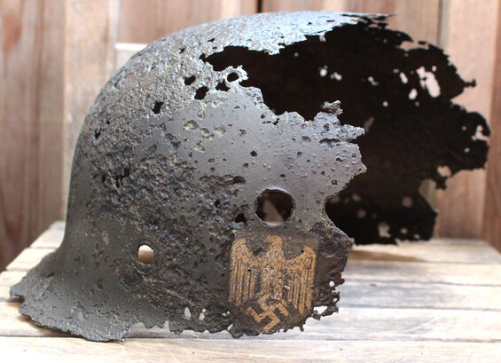 Piece of Wehrmacht helmet / from Karelia