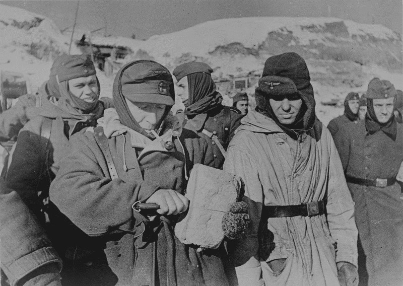 Captured Germans split bread, district of Stalingrad