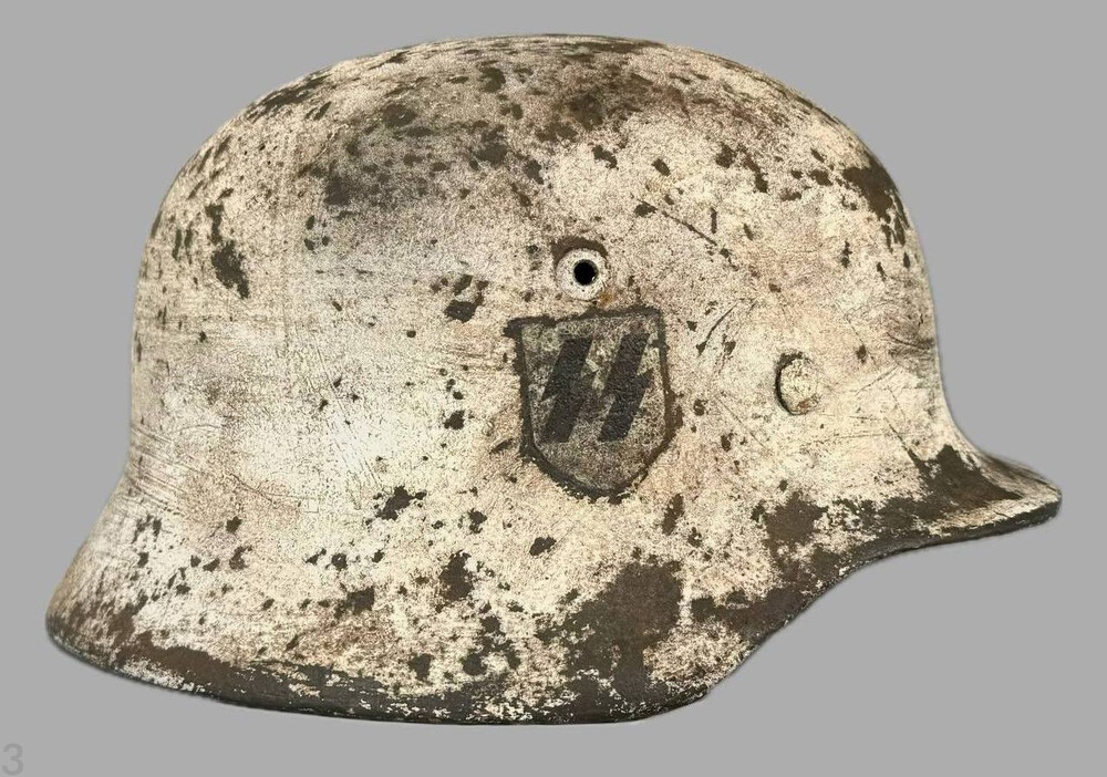 Restored Winter camo helmet M35