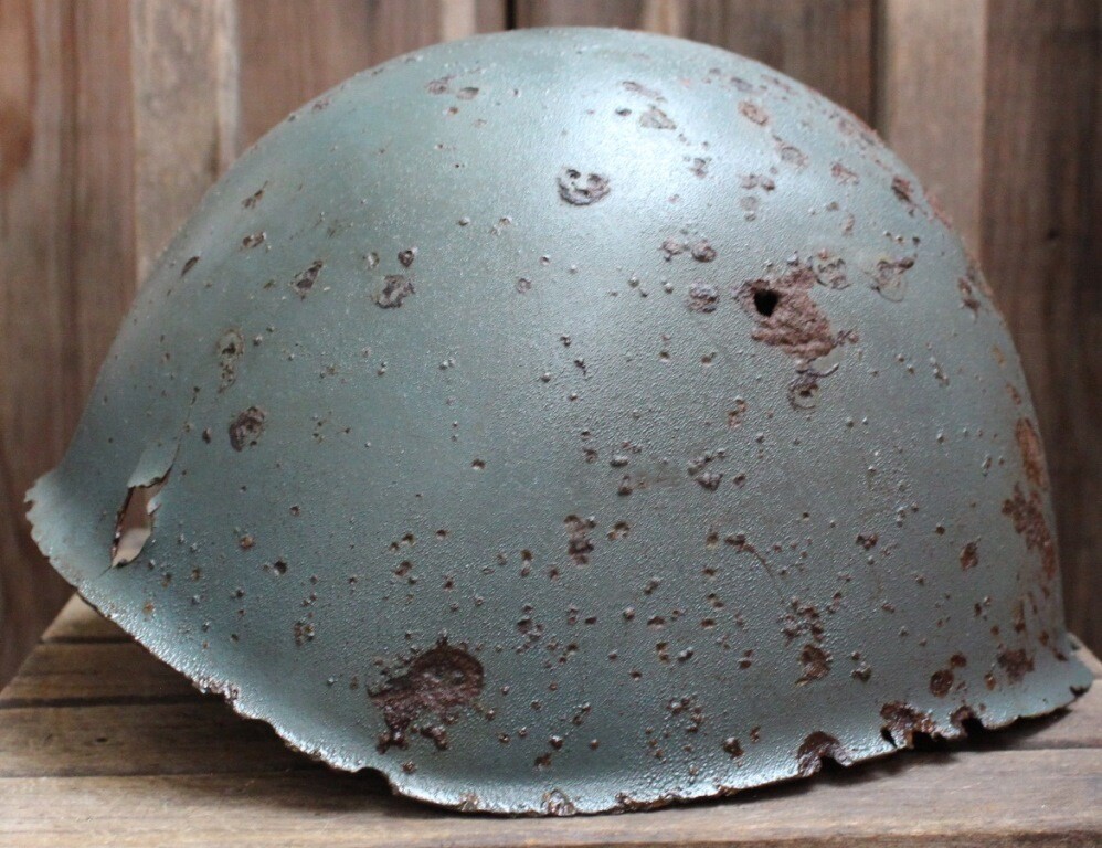 Italian helmet M33 / from Karelia