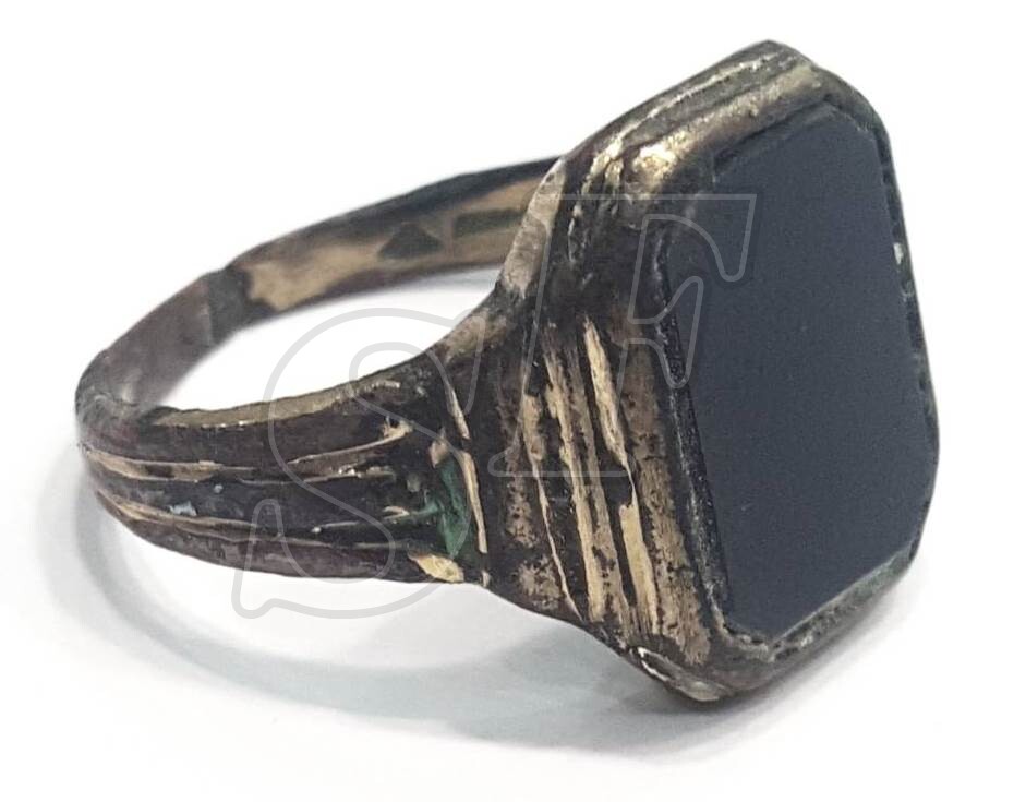 Ring with black stone